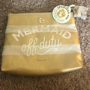 Gold and white striped Spartina 449 cosmetic bag
